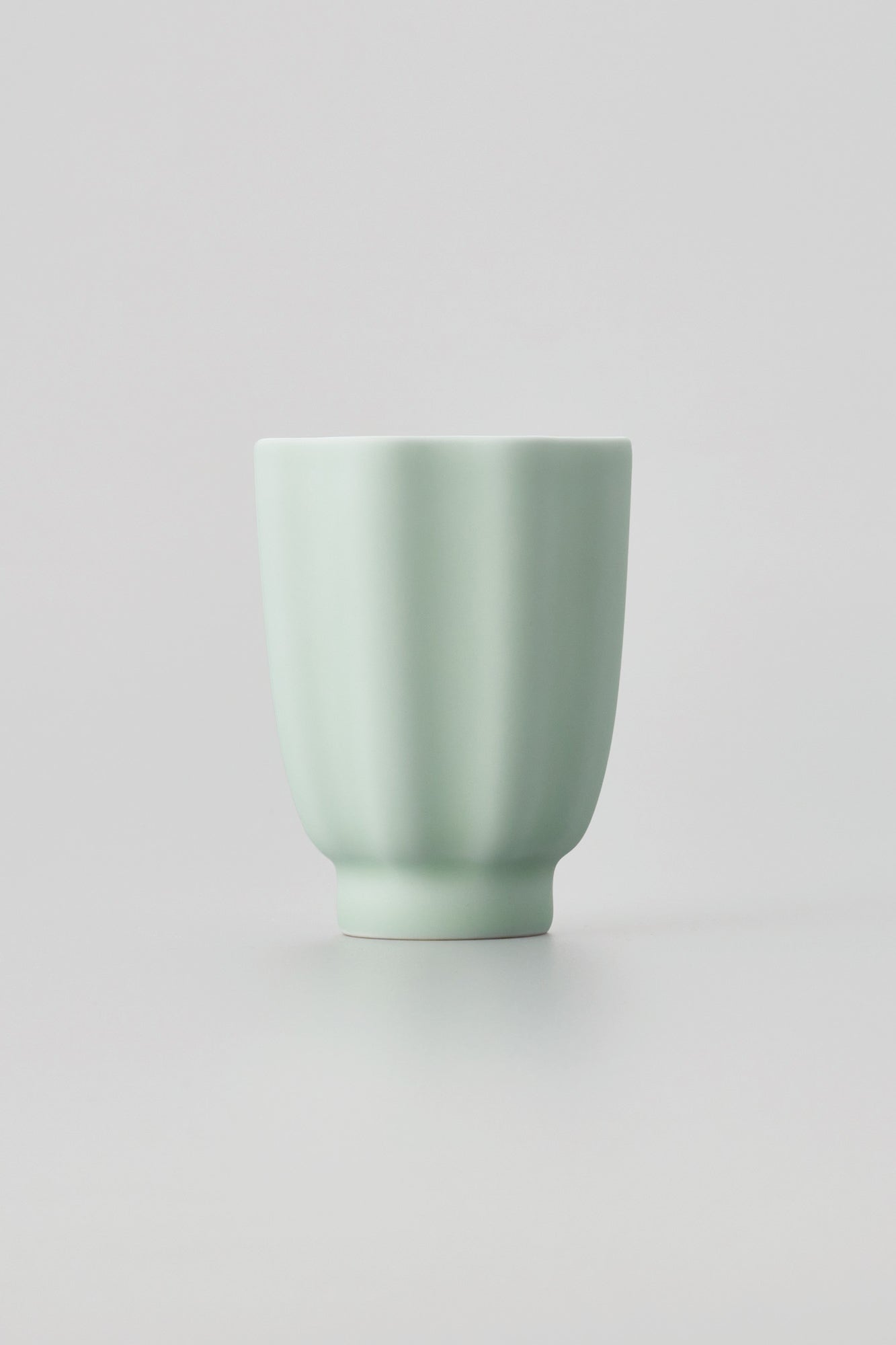 PORCELAIN POTTERY TEA CUP