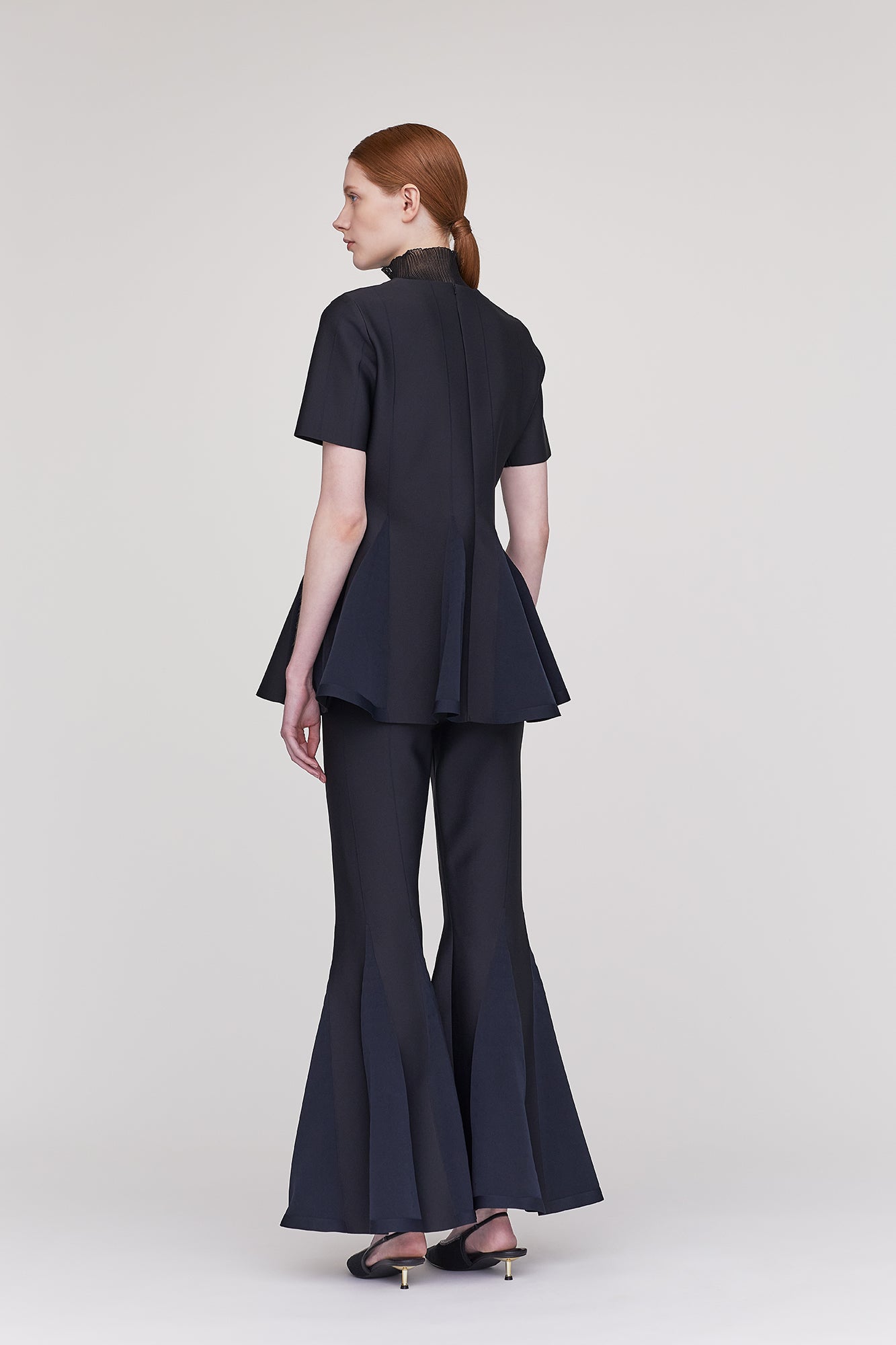 CONIC TIGHT FLARE PANTS