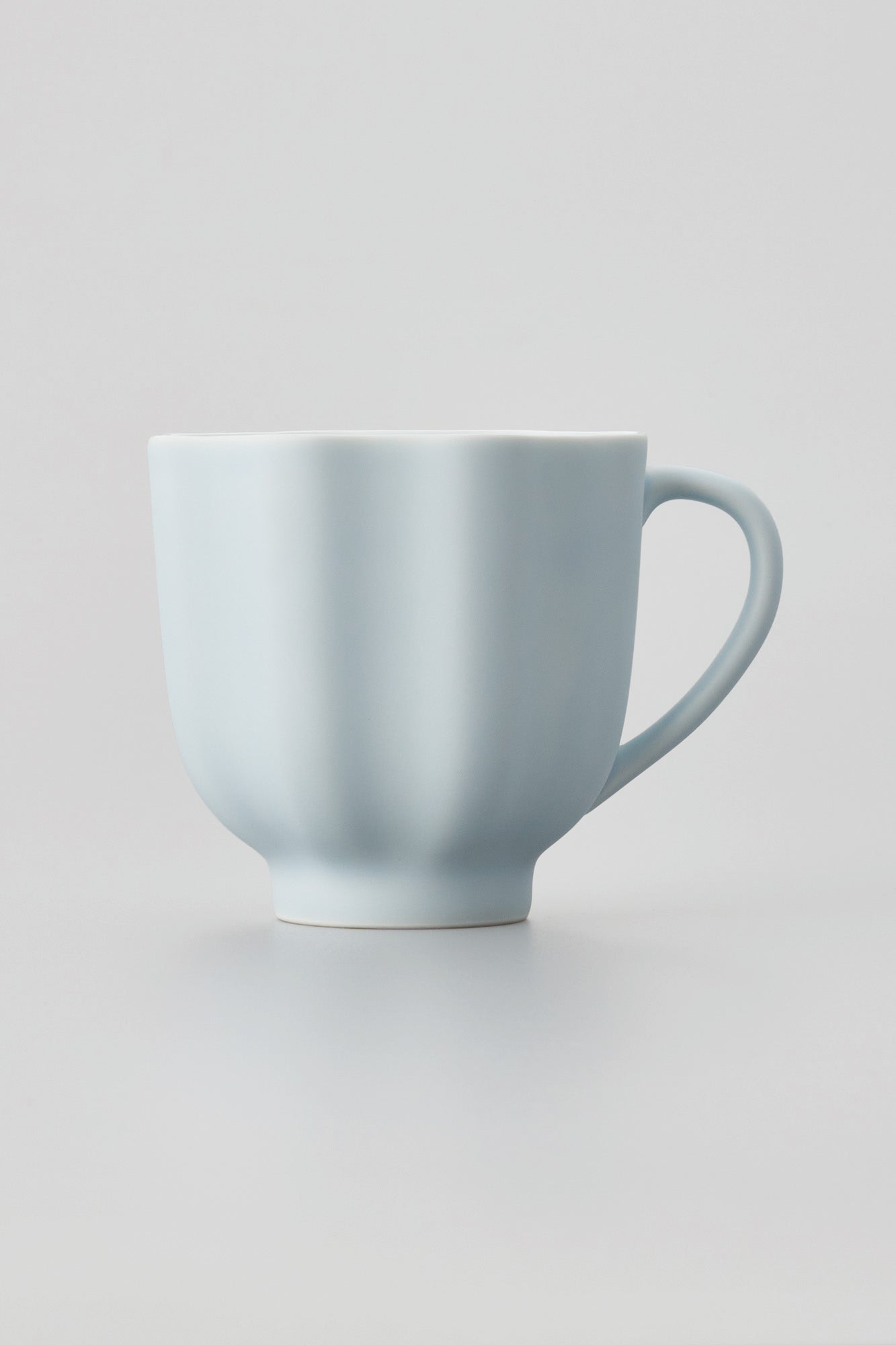 PORCELAIN POTTERY TEA MUG