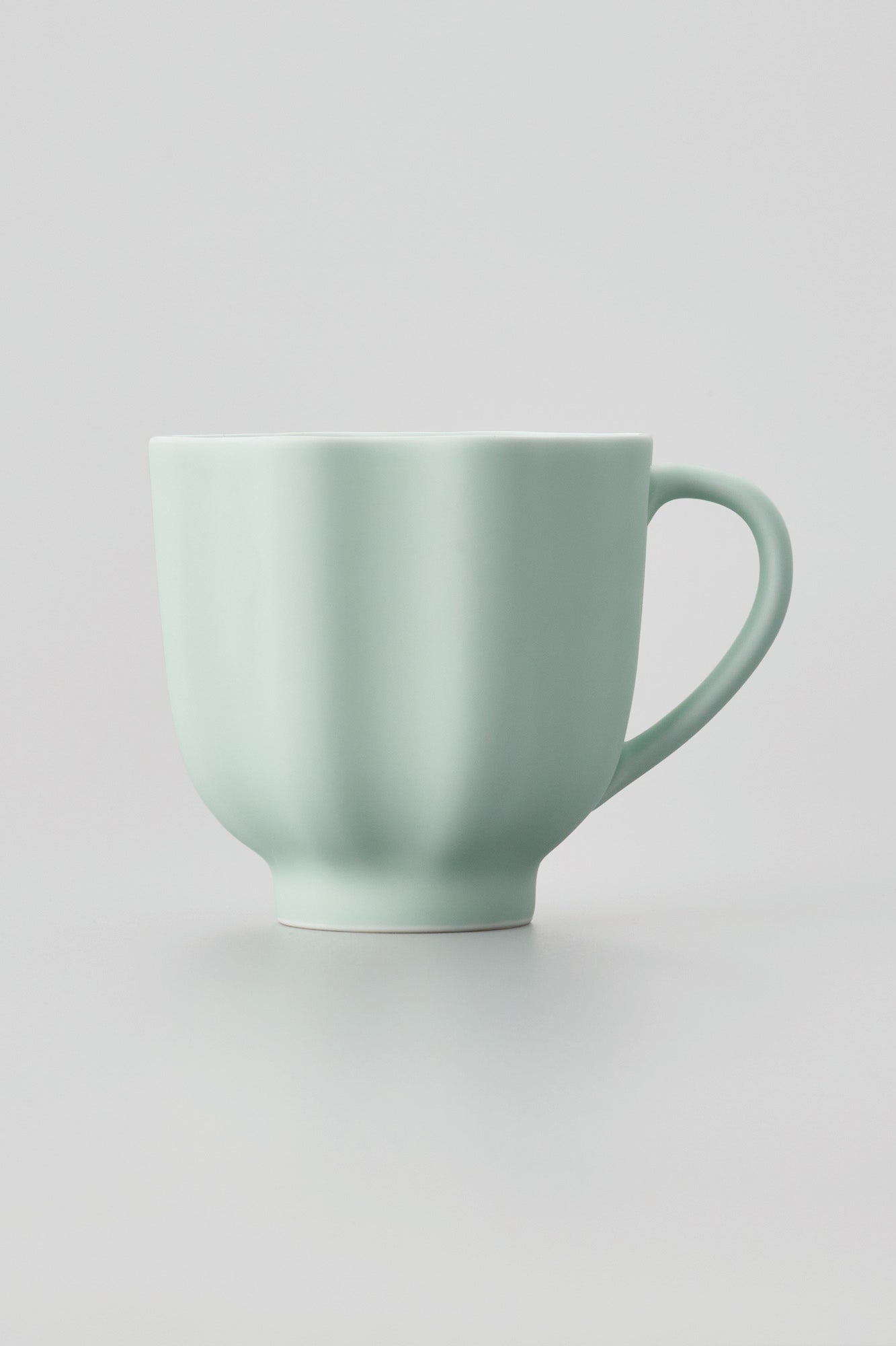 PORCELAIN POTTERY TEA MUG